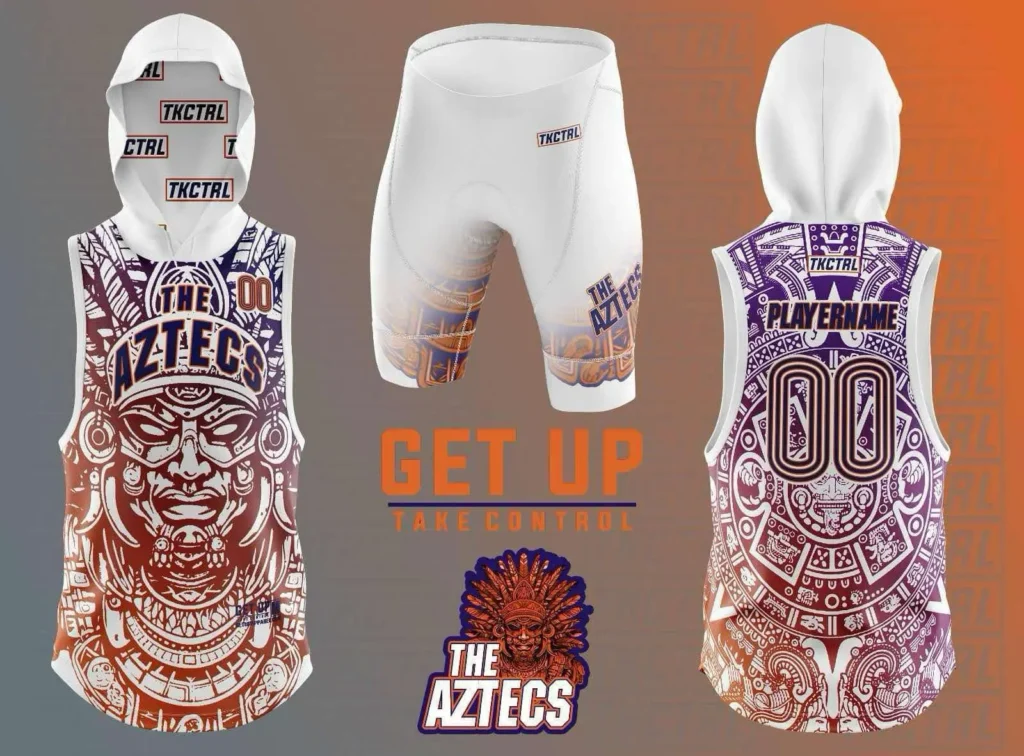 TKCTRL athletic set with white hooded jerseys and shorts featuring Aztec-inspired designs, number 00, "THE AZTECS" branding, and "GET UP TAKE CONTROL" text on gradient background.