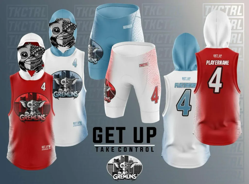 TKCTRL basketball uniforms in red, white, and blue featuring gremlin mascot graphics, cityscape backgrounds, number 4, "GREMLINS" team name, and "GET UP TAKE CONTROL" branding.